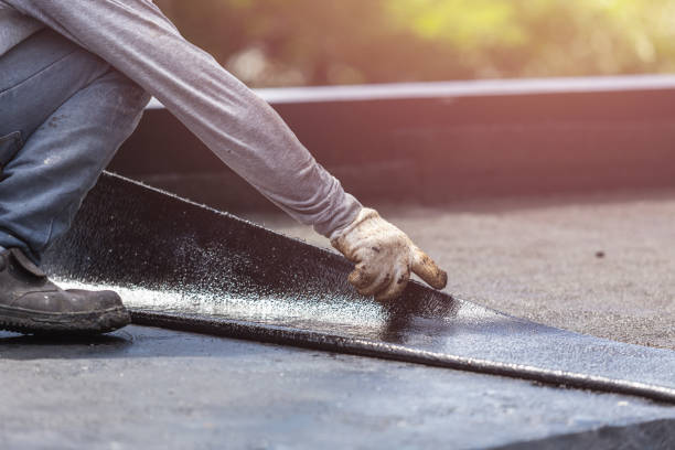 Professional Waterproofing technician working in Beachwood, OH
